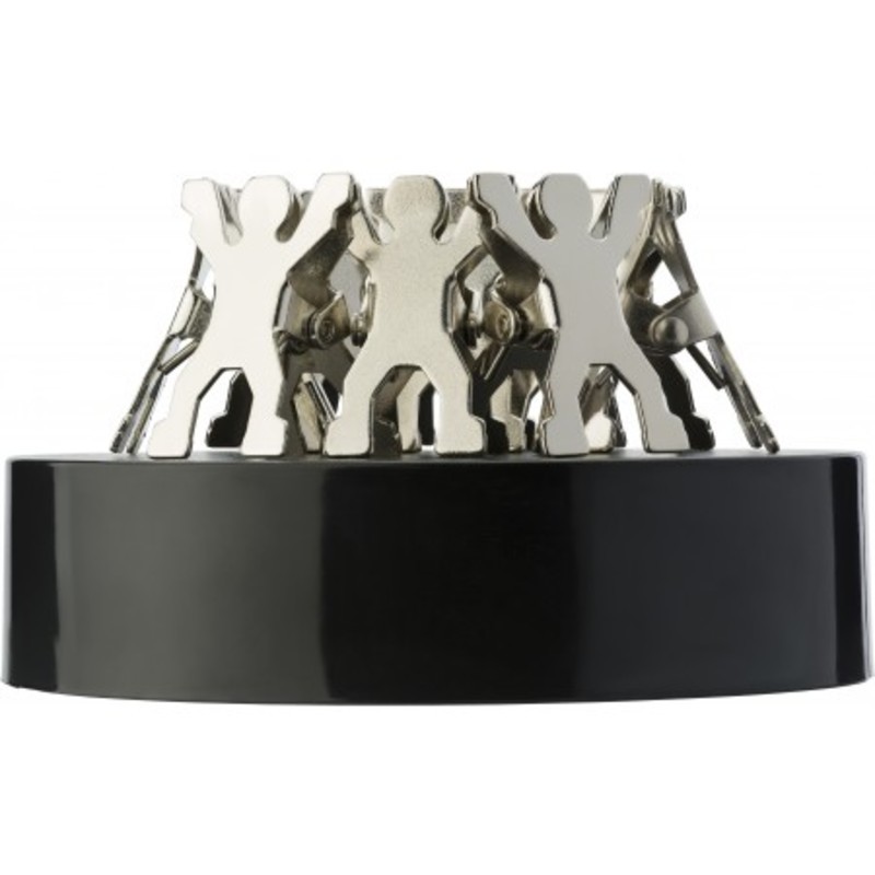 Black, oval shaped paperweight with magnet